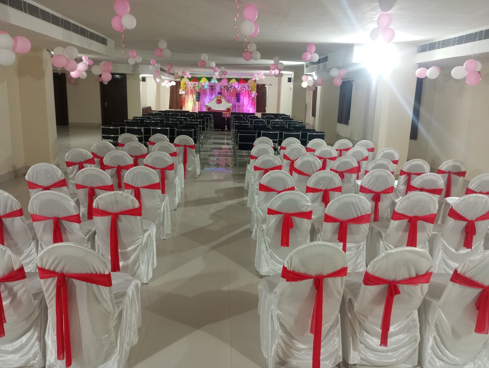 Banquet seating setup for an event at Welcome Tower Gaya